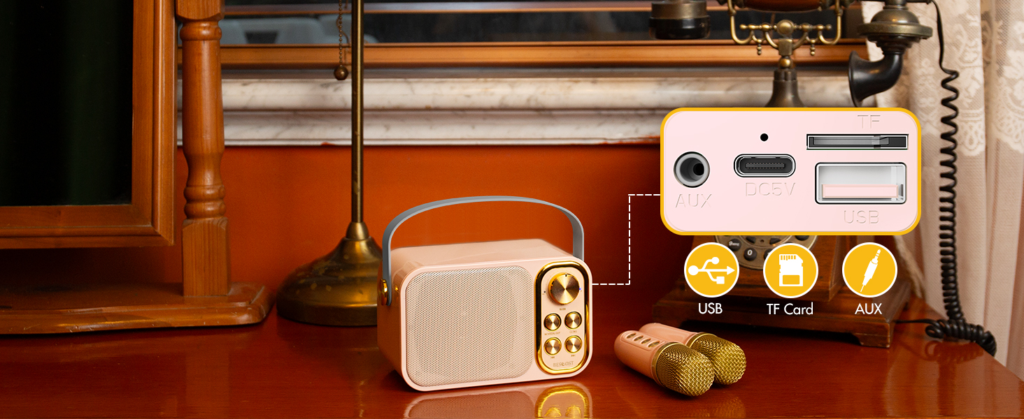 Retro-style radio with digital display, USB port, and SD card slot. Brass instruments and old telephone in background.