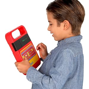 Kid playing with Speak and Spell