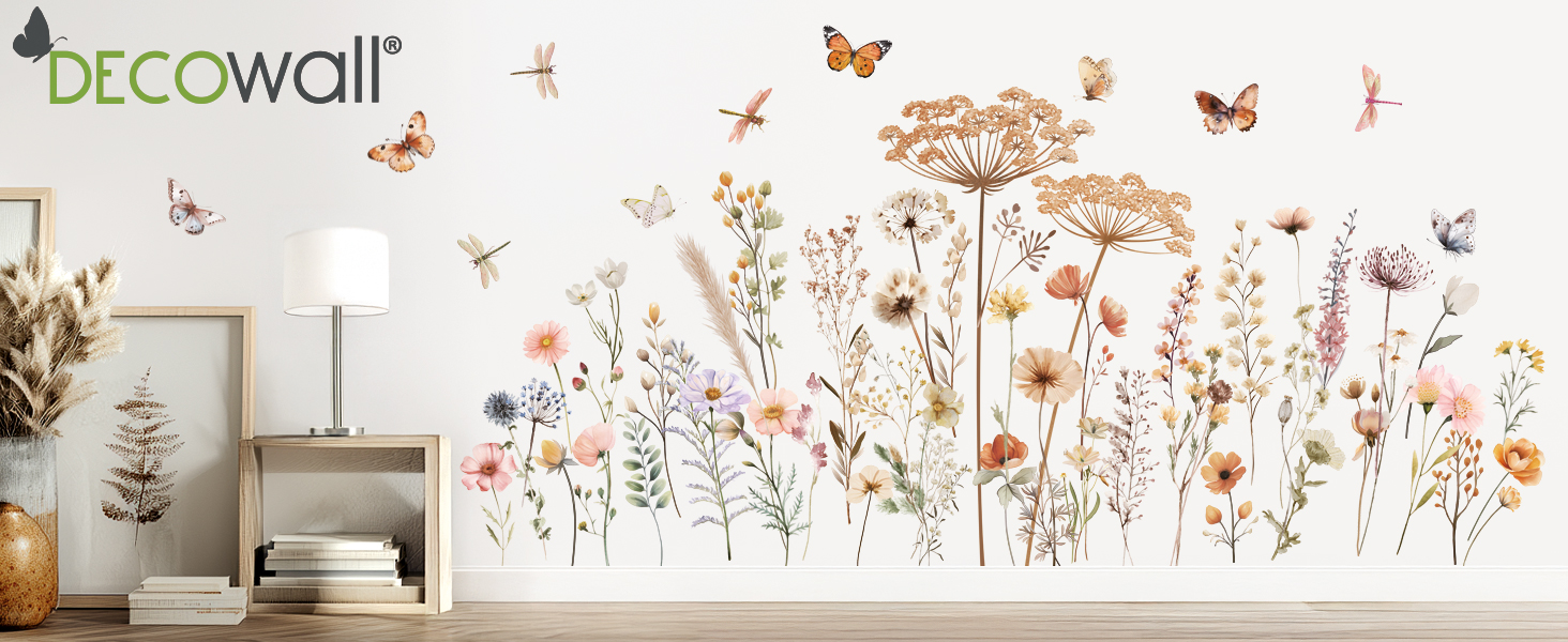Text reads 'DECOWALL'. Identical floral wall decal design as Image 2, showing wildflowers and butterflies in orange tones against white wall.