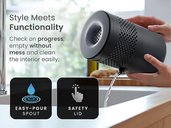 Hand holding gray kitchen strainer over sink. Text overlay highlights 'Easy-pour spout' and 'Safety lid' features. Caption reads 'Style Meets Functionality'.