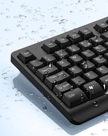a black computer keyboard with water droplets on it.