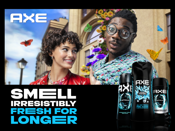 Image of a goofy-looking man &amp; a pretty woman staring at him, next to AXE products lineup &amp; text. 