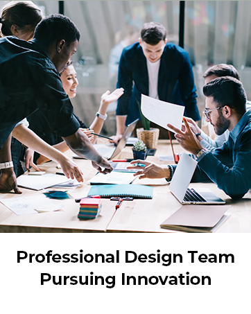 A workspace setting showing a table with laptops, papers, and coffee cups where people are collaborating over documents.