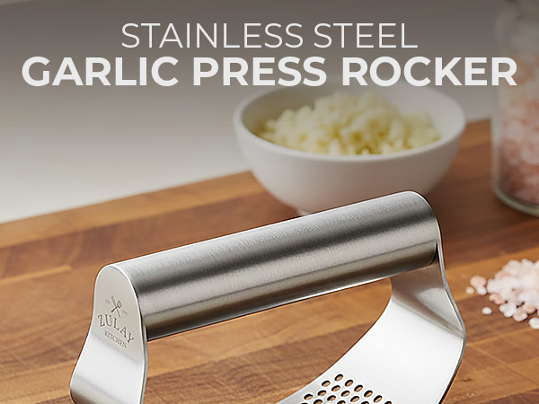 Stainless steel garlic press rocker with ergonomic grip for effortless garlic mincing.