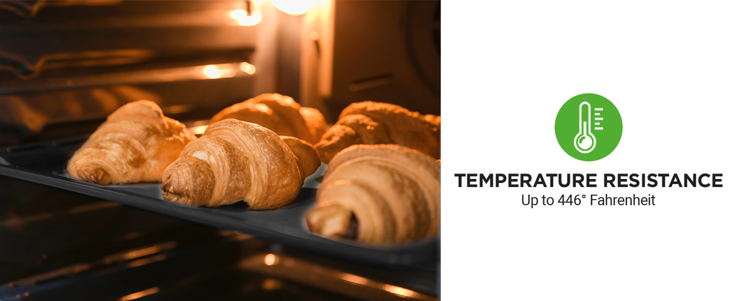 croissants on oven pan inside hot oven showcasing temperature resistance of sheet pans for baking