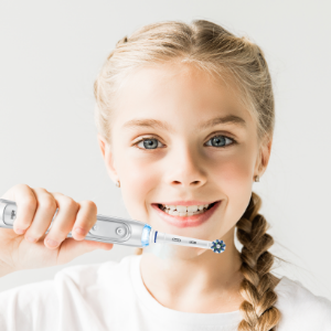 Child with toothbrush