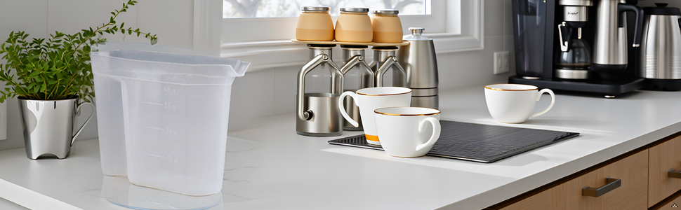 A sleek and modern kitchen counter with the product placed in the center, surrounded by various coff