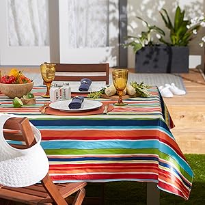 DII Summer Stripe vinyl tablecloth with garden view