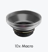 Circular camera lens attachment with wide metal rim and narrower base. Text '10x Macro' visible, indicating magnification capability for close-up photography.