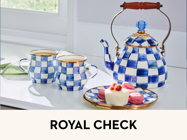 White-and-blue dishes on a table. Text reads: Striking color-dragged checks.
