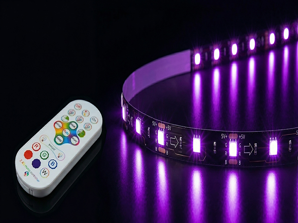 Peel-and-stick LED strip being applied to the back of a TV for ambient backlighting.