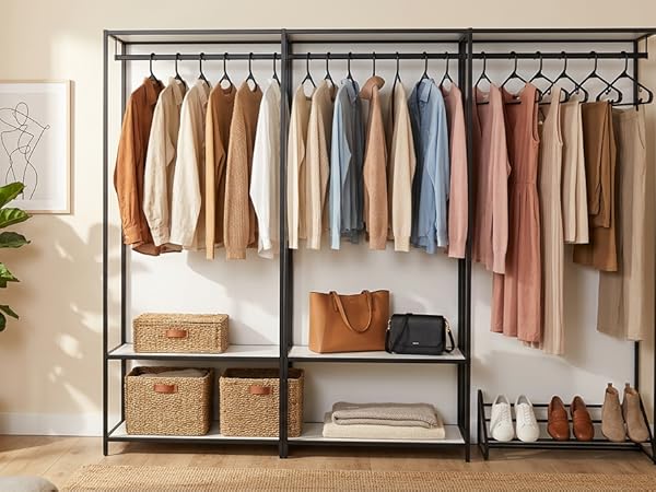 Open closet with black hangers holding shirts, jackets, and pants. Sleek uniform look
