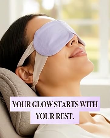 Relaxed woman wearing a LumiDew heated eye mask for restful beauty sleep.