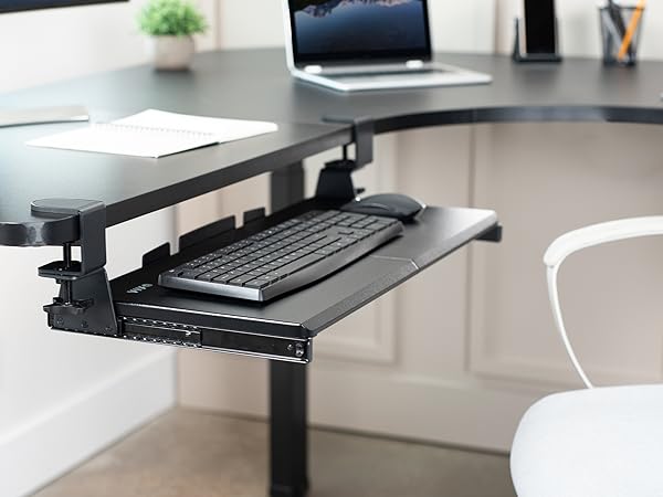 Keyboard and mouse on keyboard tray