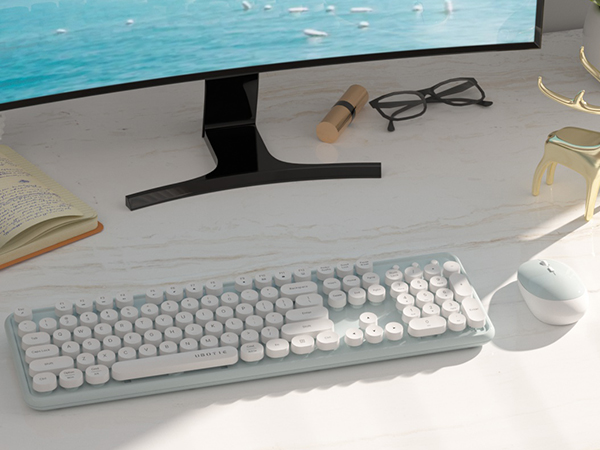 green white wireless keyboard and mouse