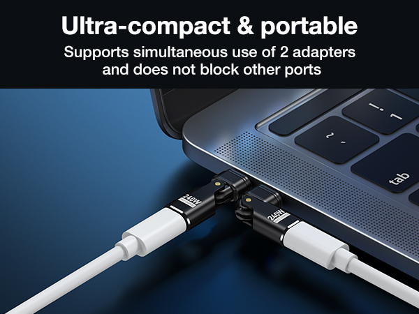 Ultra-compact USB adapters plugged into laptop ports. Two white cables connected. Text states 'Ultra-compact &amp; portable' and mentions simultaneous use of 2 adapters without blocking other ports.
