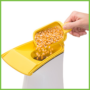 Chute directs popcorn right into your bowl.