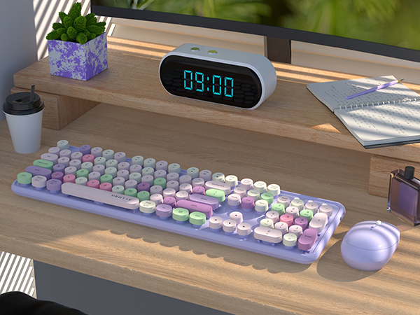 purple colorful wireless keyboard and mouse