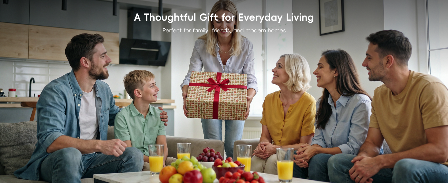 Woman presenting a wrapped gift to family and friends gathered with fresh juice