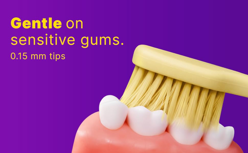 Soft toothbrush with 0.15 mm tapered bristle tips designed for sensitive gums and gentle brushing.