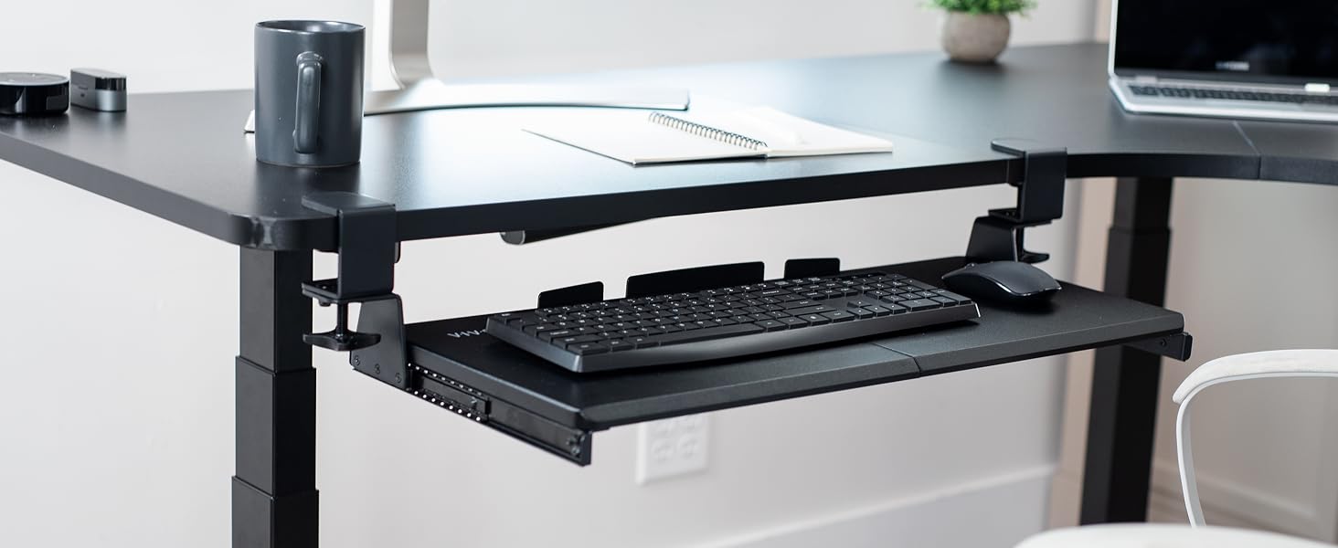 Keyboard and mouse on keyboard tray
