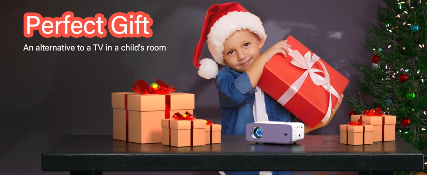 Holiday scene with wrapped gifts, miniature Christmas tree, and a digital projector, suggesting alternatives to traditional TV for children's entertainment.