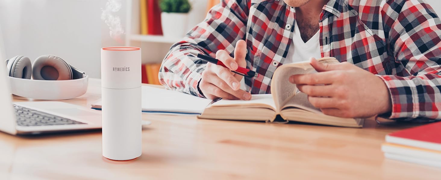 white air purifier on desk