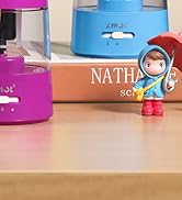 Text reads 'NATHA'. Blue and pink cylindrical containers on surface with small decorative figure in red outfit.