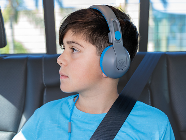 Blue JBuddies Studio 2 Wired Headphones on a young boy