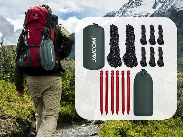 Hiker with red backpack in mountains. Camping accessories displayed: green stuff sacks, black cords, red tent stakes, and a water bottle.