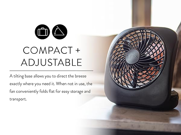 Treva 5 Inch Desk Fan Gray on living room table