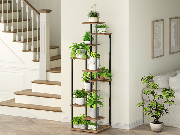 Place a plant rack in your stairwell to store your favorite potted plants