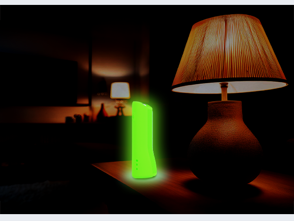 Remote case glowing in the dark on table for easy nighttime visibility