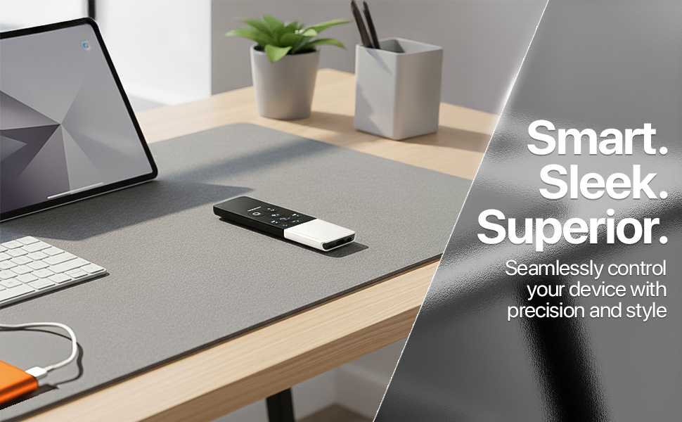 Minimal Bluetooth remote control on a tidy desk.
