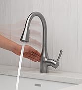 Hand waving to turn on faucet