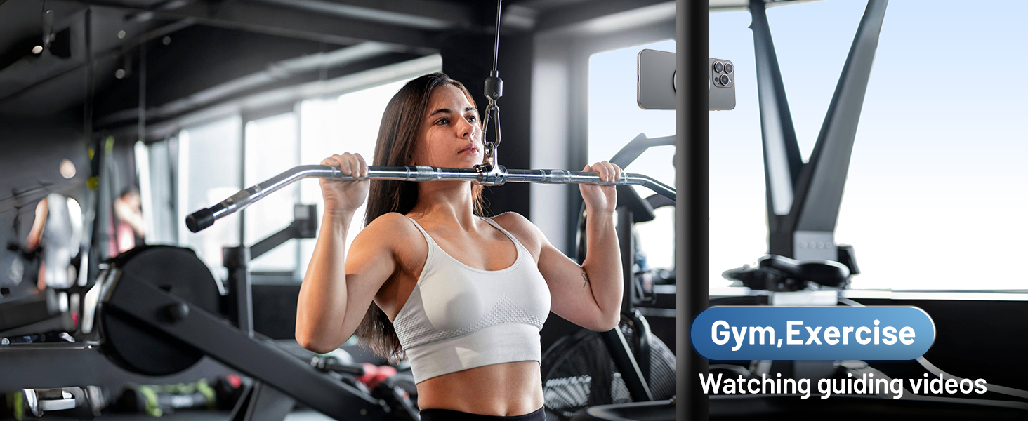 use the phone ring holder to attach on the metal section in the gym to watch guiding videos
