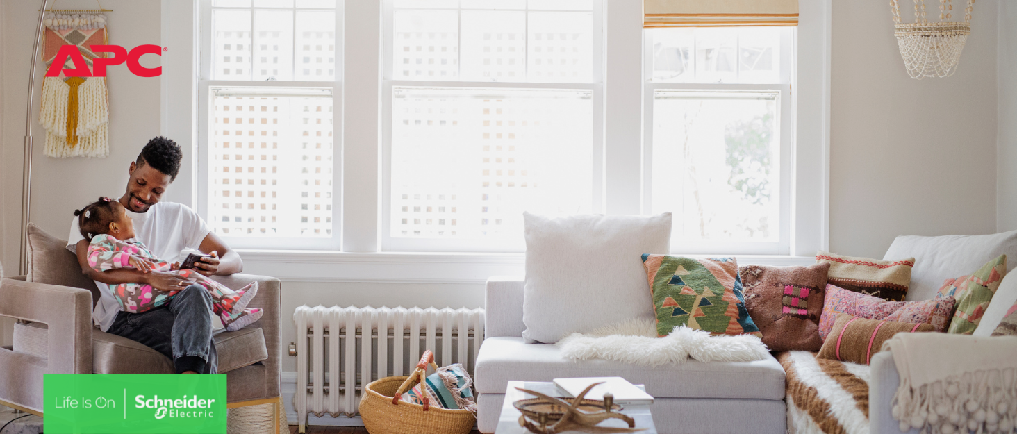 Father and daughter enjoying looking at a tablet