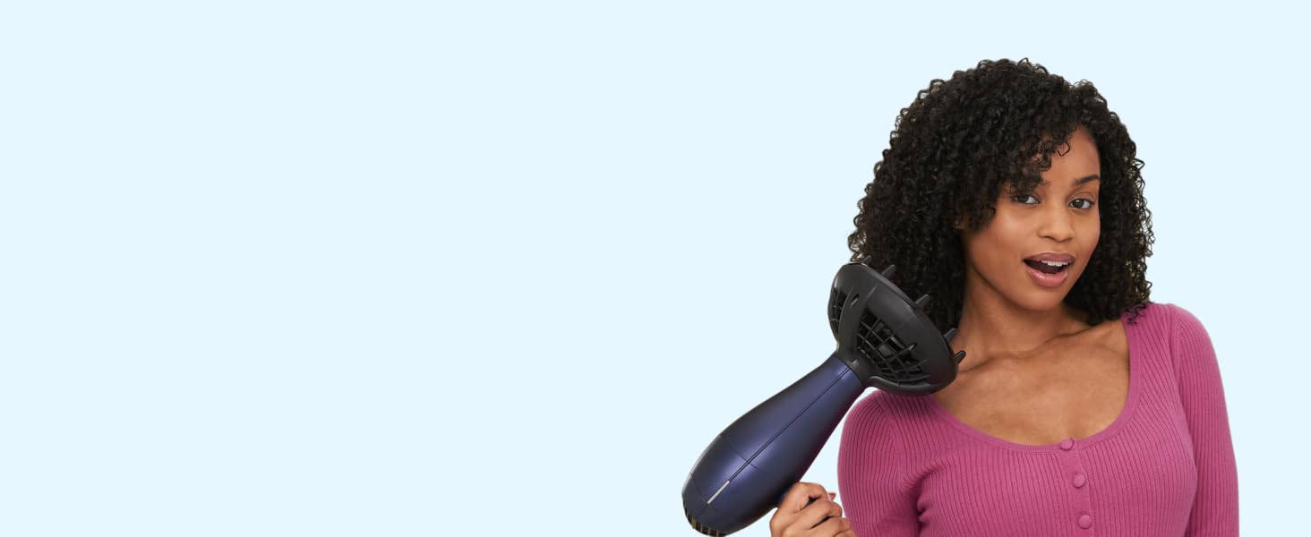 Woman using diffuser attachment