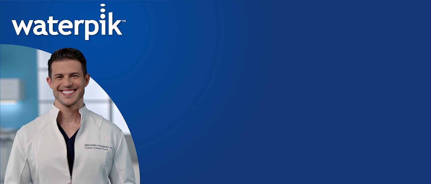 Dr. Strandburg smiling, blue background, waterpik logo