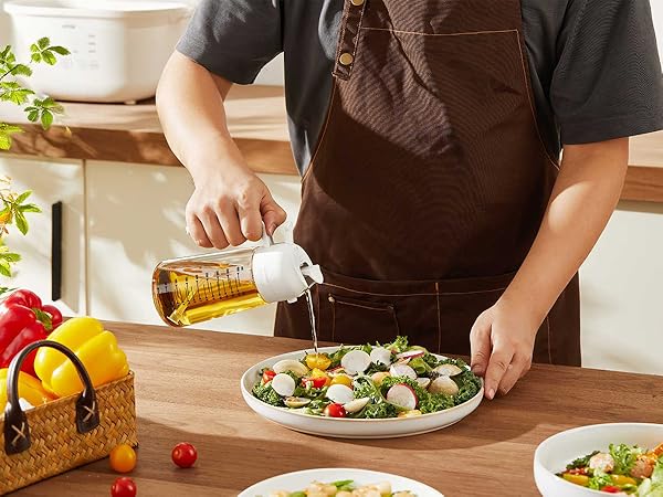 Series of images showing hands preparing and dressing a fresh salad with various ingredients and pouring dressing.