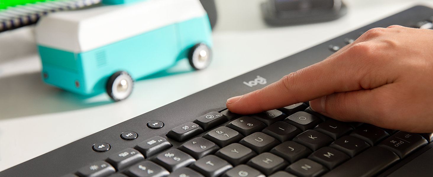 Zoom of hands typing on K650 keyboard in graphite