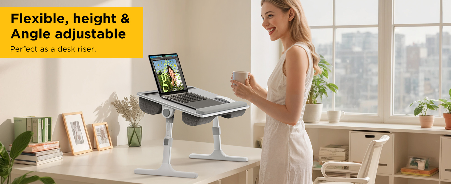 Woman using adjustable laptop desk as a standing workstation for home office tasks.