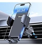 Car phone holder with adjustable grip arms mounted on air vent. Holds smartphone displaying time 18:34. Sleek black design with blue accent lighting.
