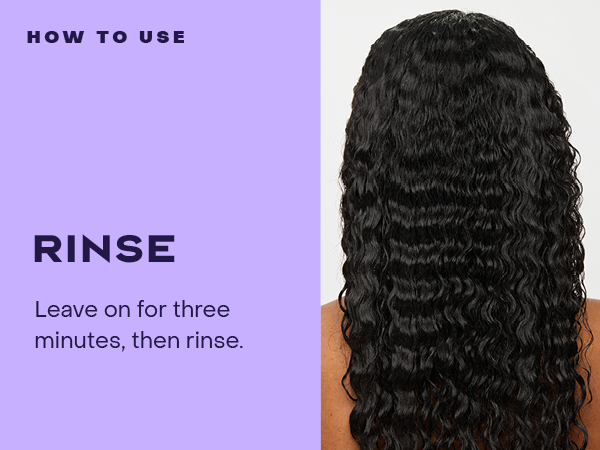 Woman's back shows long, wavy black hair, emphasizing shine &amp; health.