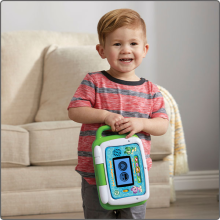 Child holding toy for on-the-go play