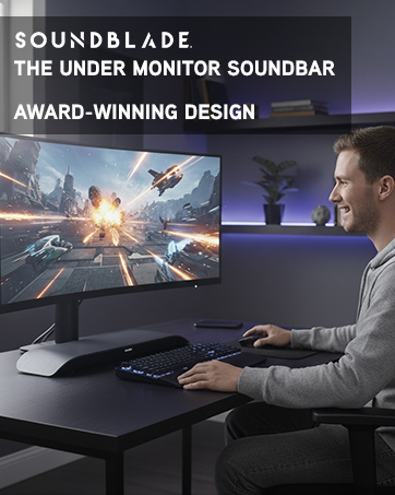 BlueAnt Soundblade Under Monitor Soundbar. A young man plays a video game using the Soundblade