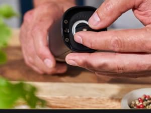 Salt and pepper grinder with batteries included