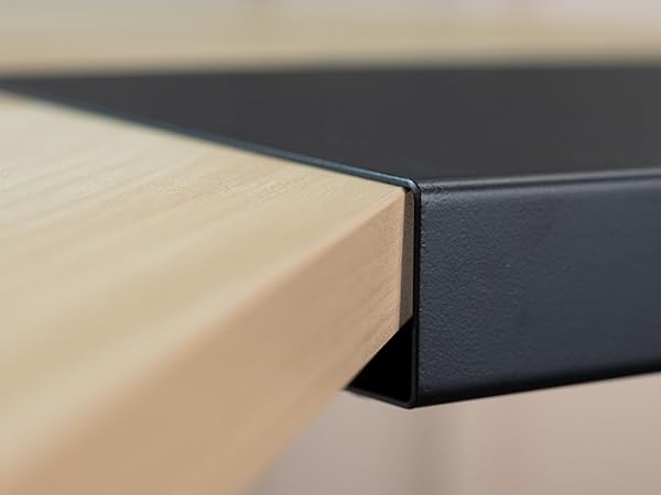Close up of lip of corner desk connector