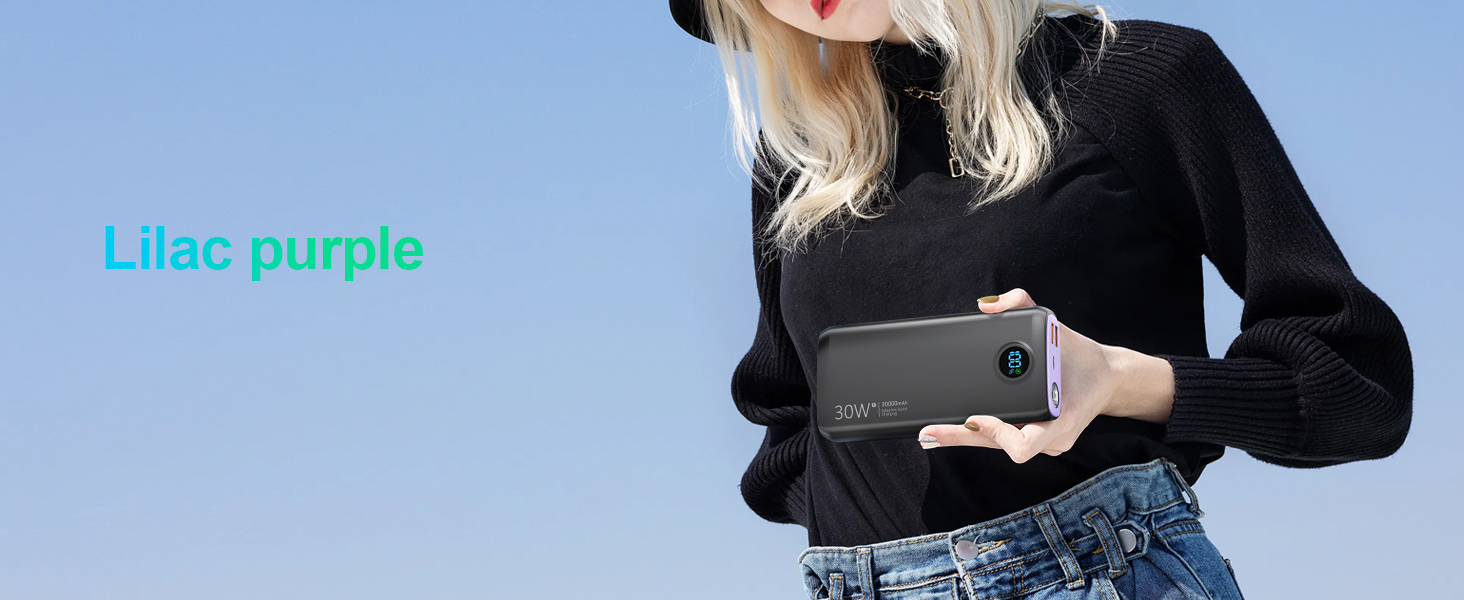 Compact portable charger with dual outputs for phones and tablets.