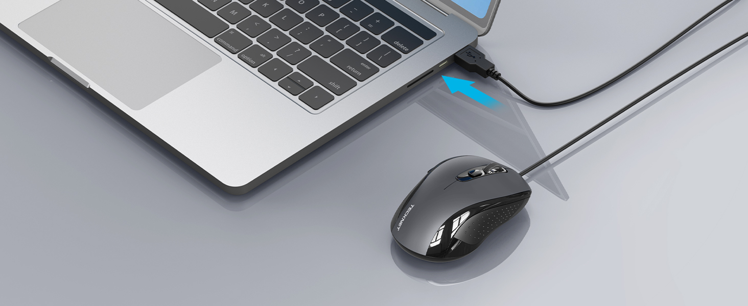 a mouse connected to a laptop computer.